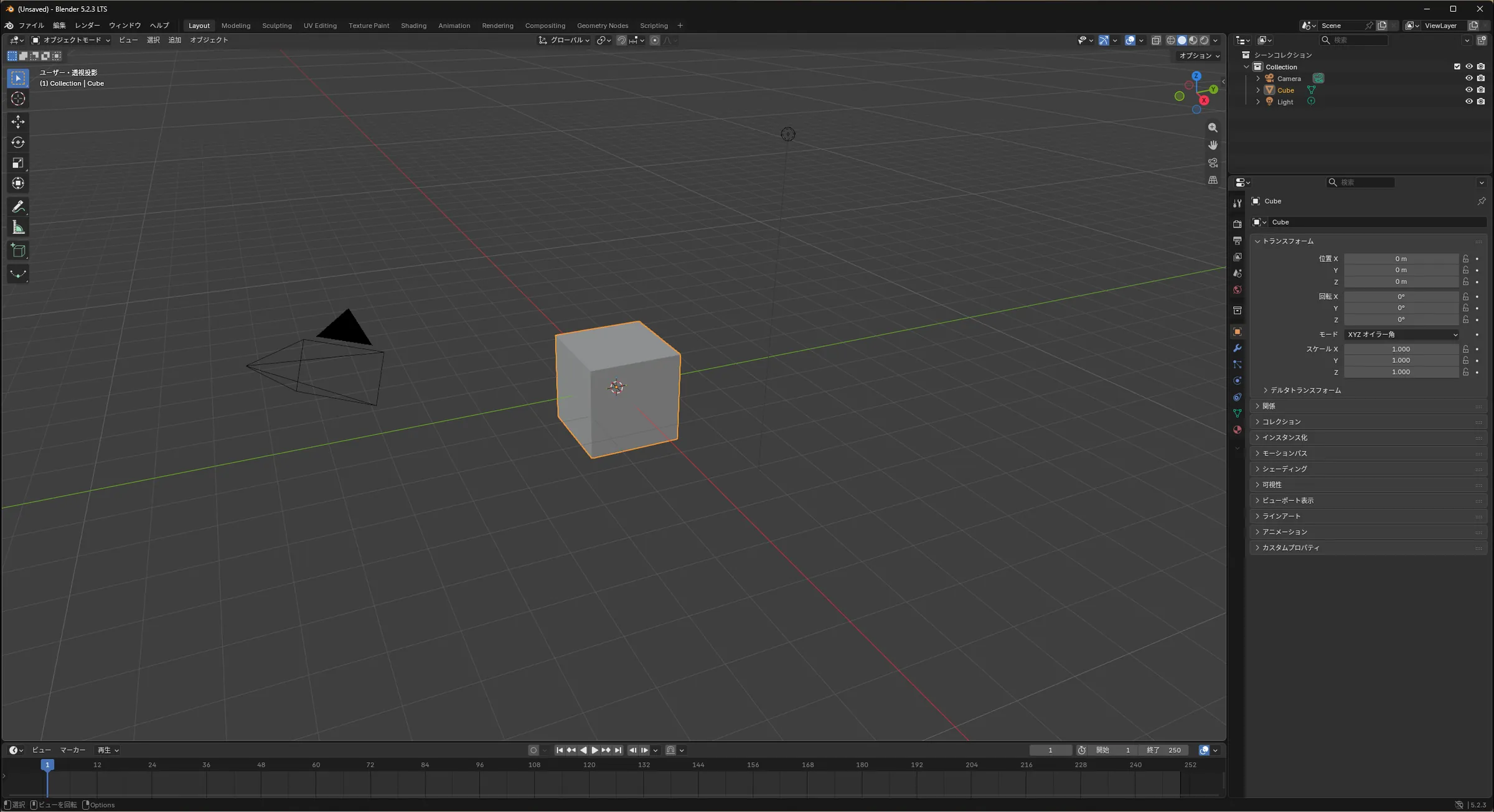 Blender 5.2.3 LTSの基本の画面。中央の3Dビューに立方体とカメラ、ライトがあり、右側にアウトライナーとプロパティが日本語で並んでいる